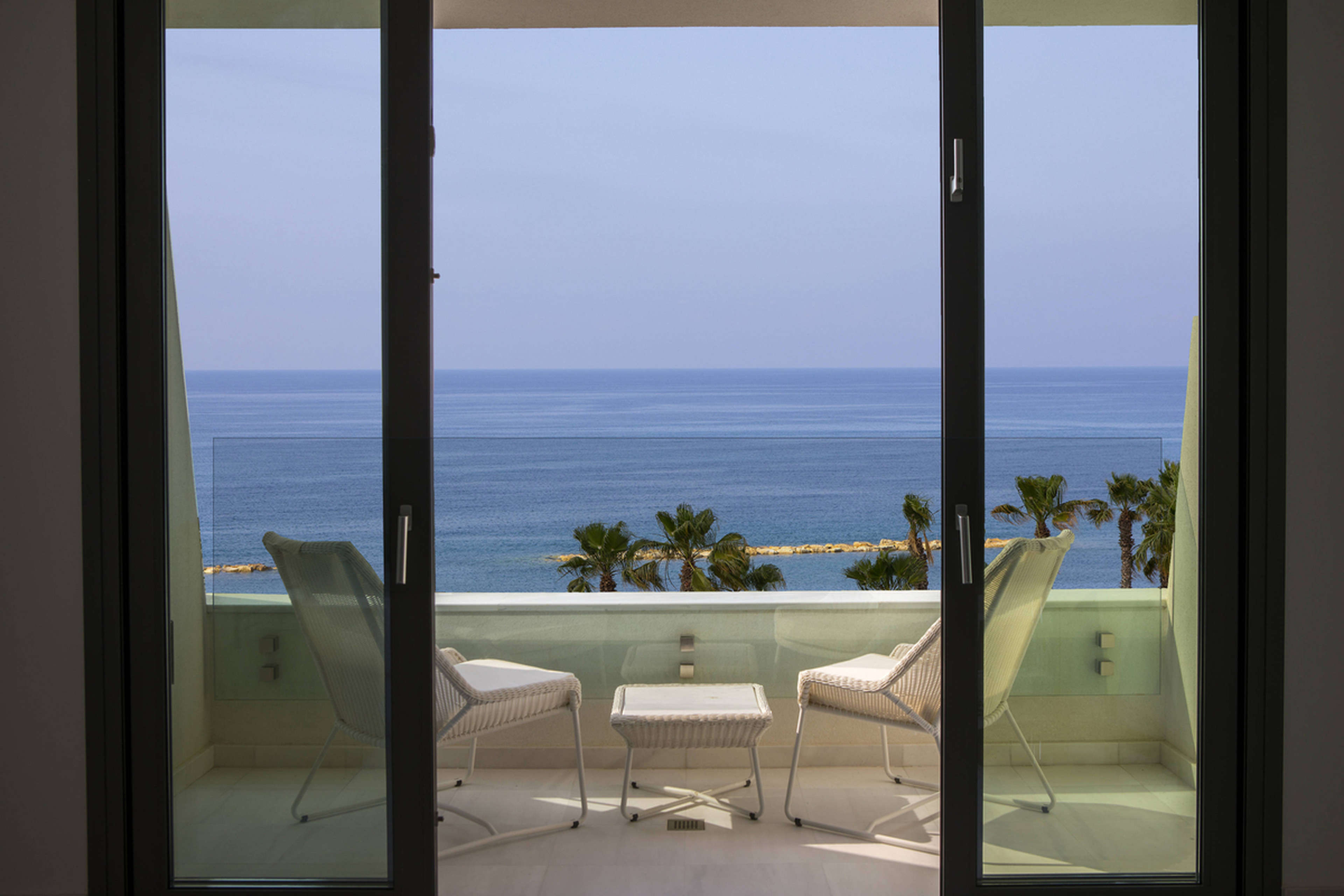 A beachfront suite with a balcony at Parklane, a Luxury Collection Resort & Spa, Limassol