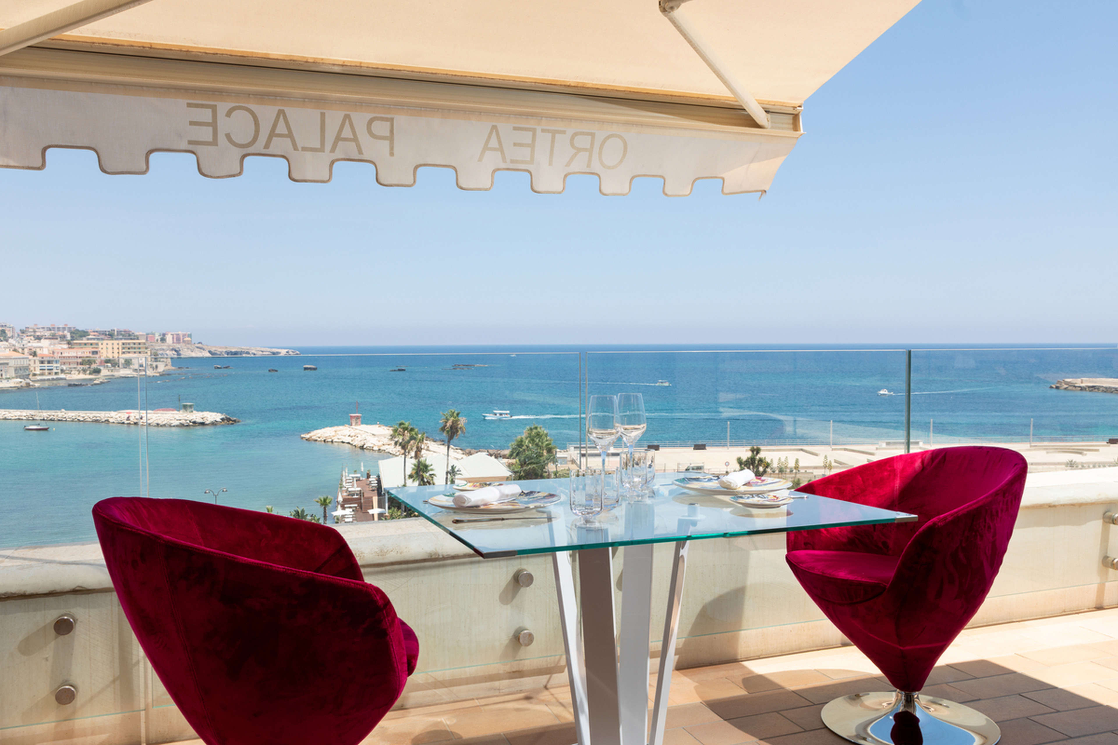A dinner table with views of the sea, Ortea Palace Hotel, Sicily, Autograph Collection