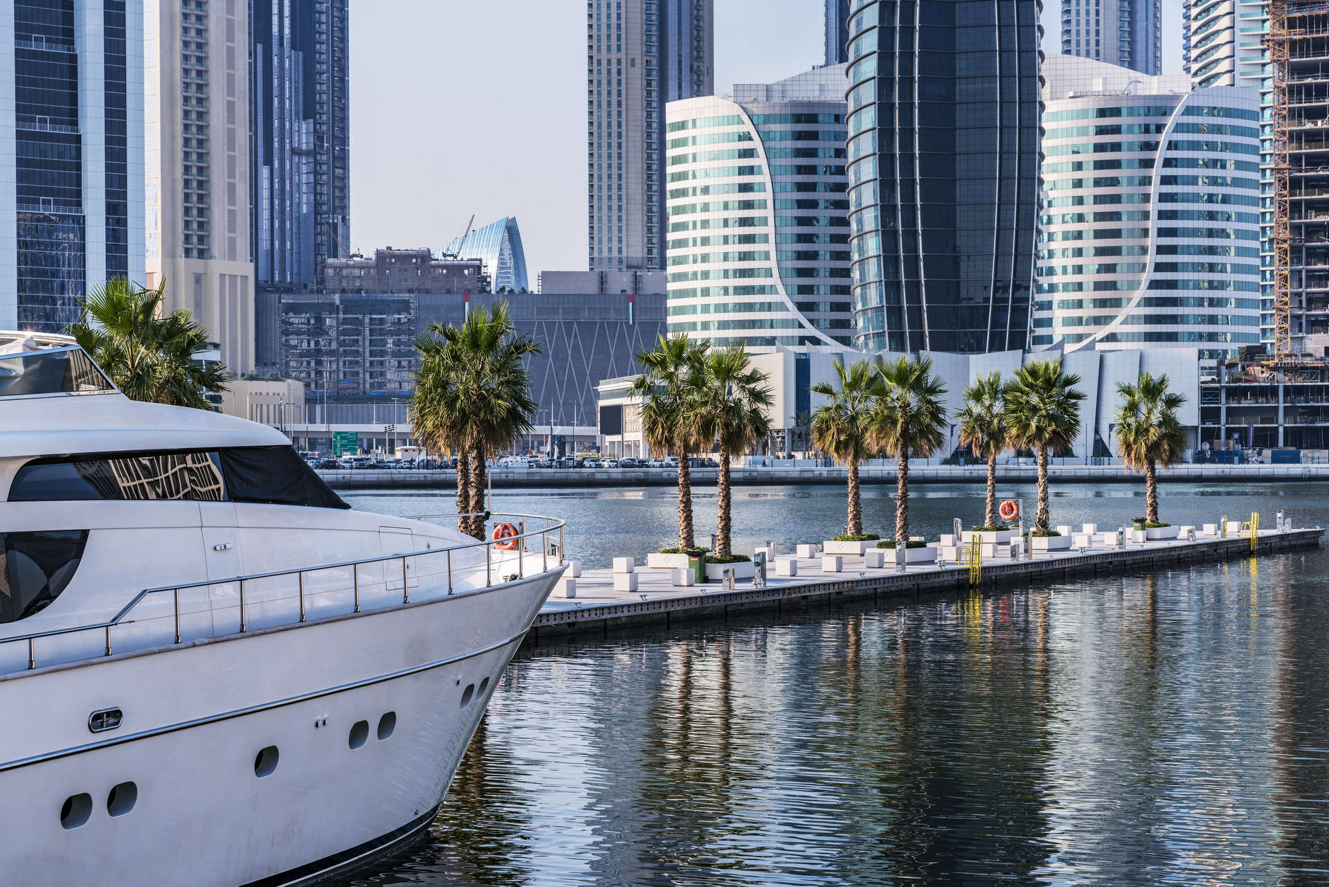 A yacht sailing into the marina in Dubai