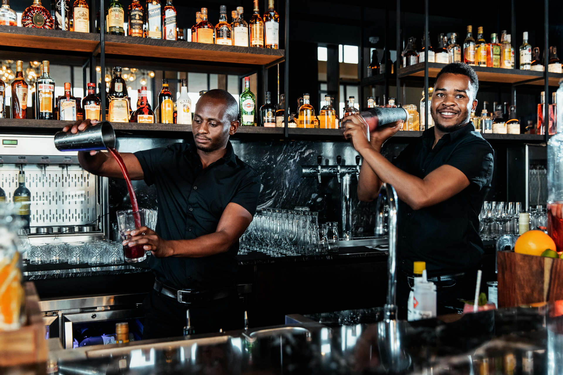 Bartenders mixing cocktails at Johannesburg Marriott Hotel Melrose Arch, South Africa