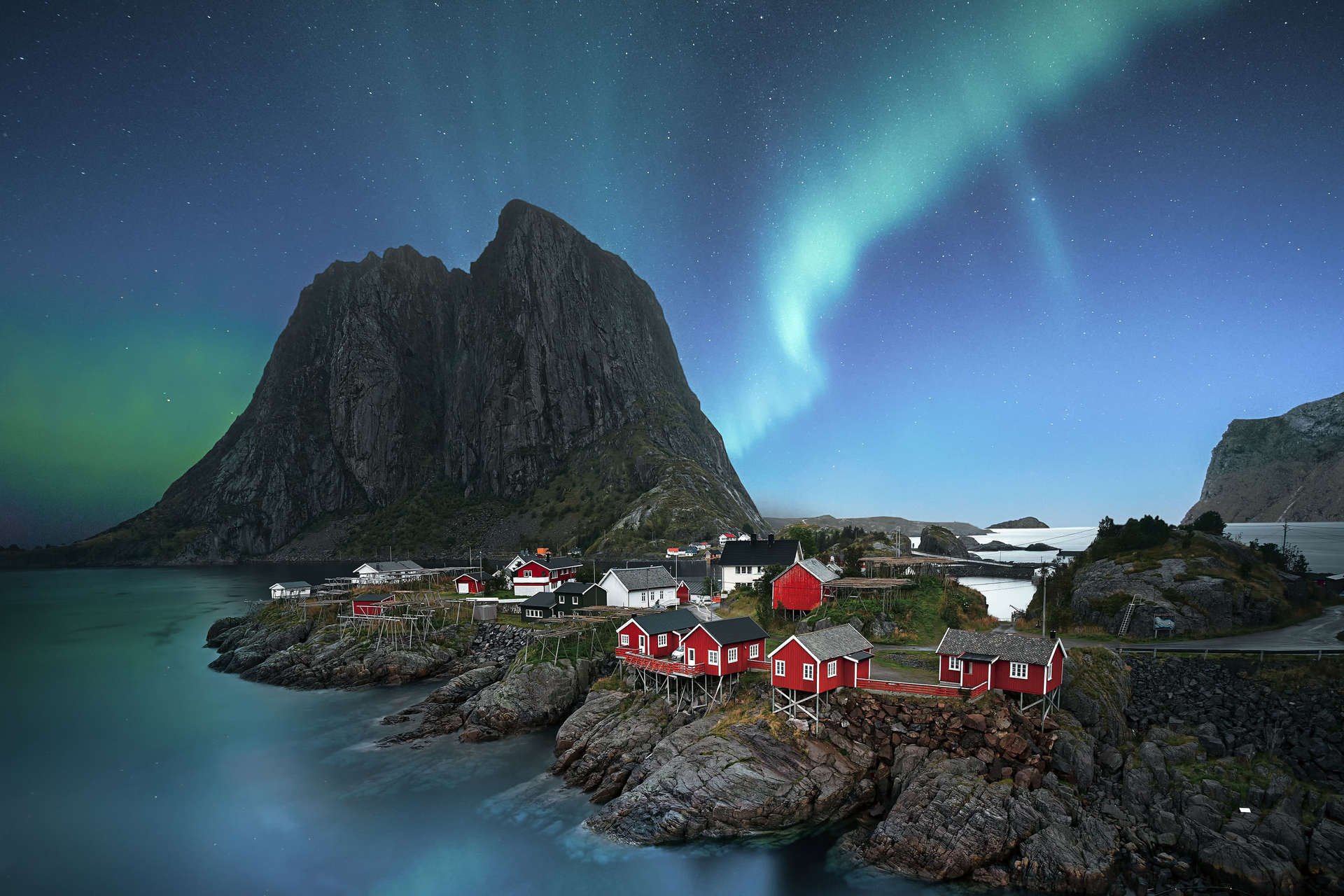 Dawn in small viilage, Lofoten and magic northern lights in sky