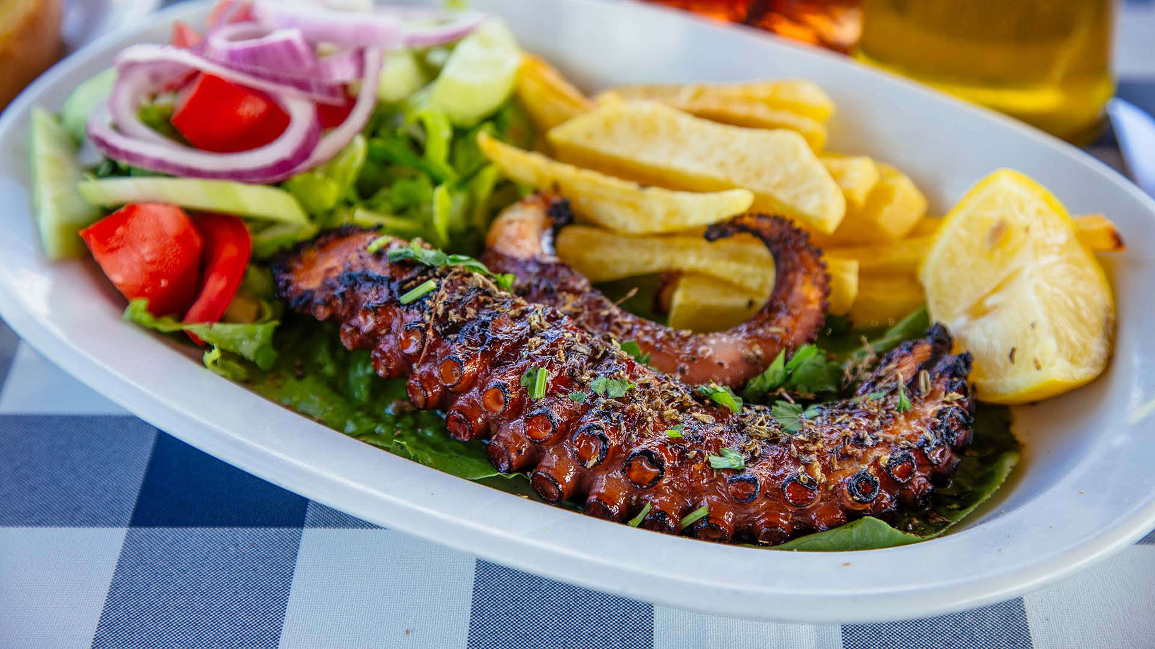 Delight in local fare like grilled octopus
