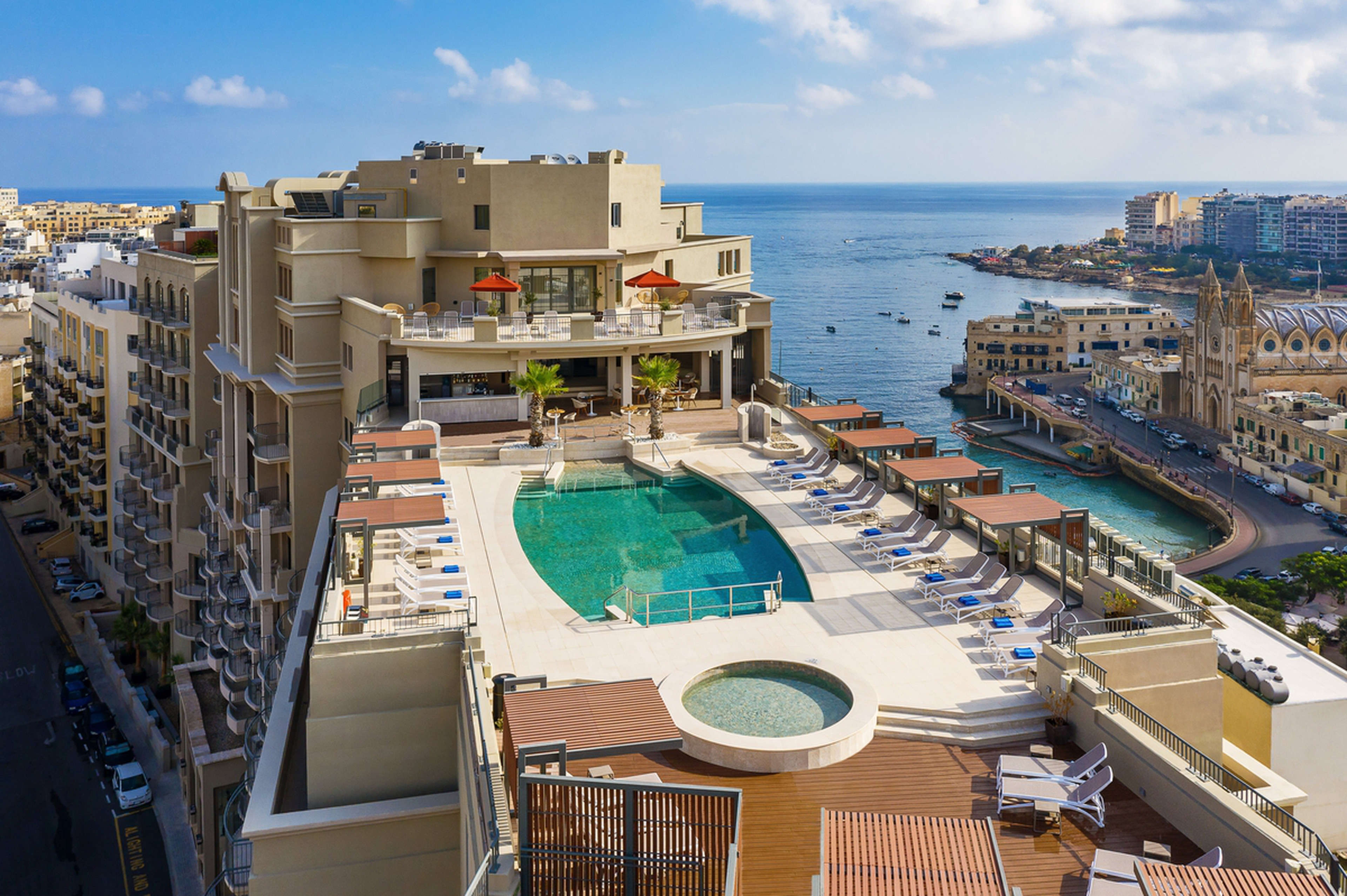 Elevated views of the Malta Marriott Resort & Spa rooftop pool