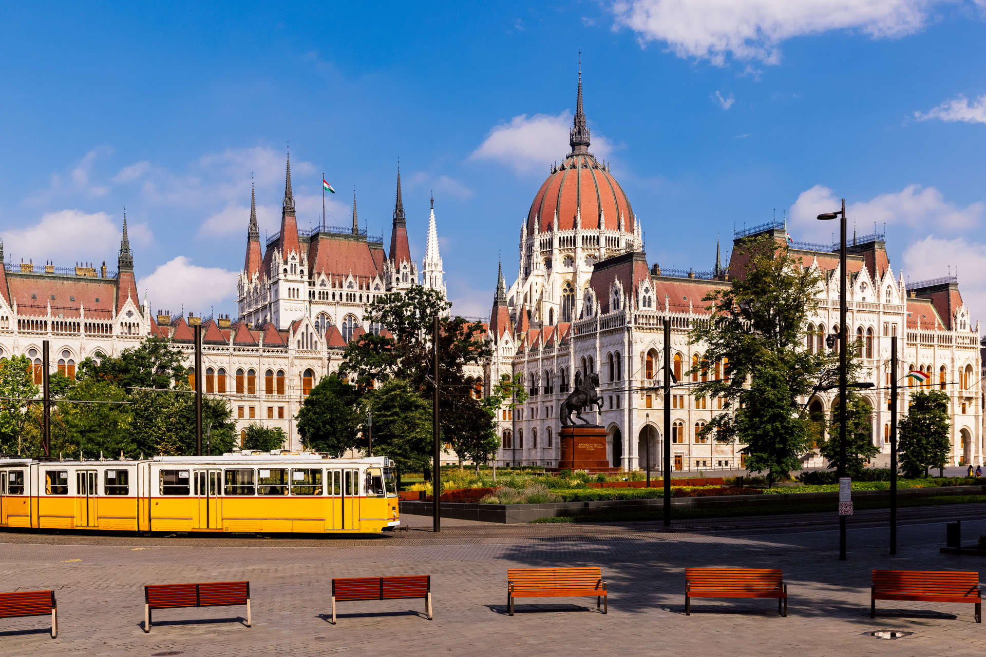 Hungarian Parliament and yellow tram in Budapest, Hungary
