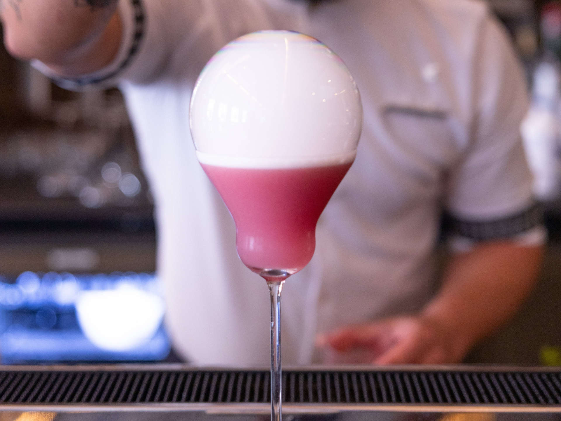 Mixologist makes inventive cocktail in the Qu Bar at JW Marriott Hotel Madrid