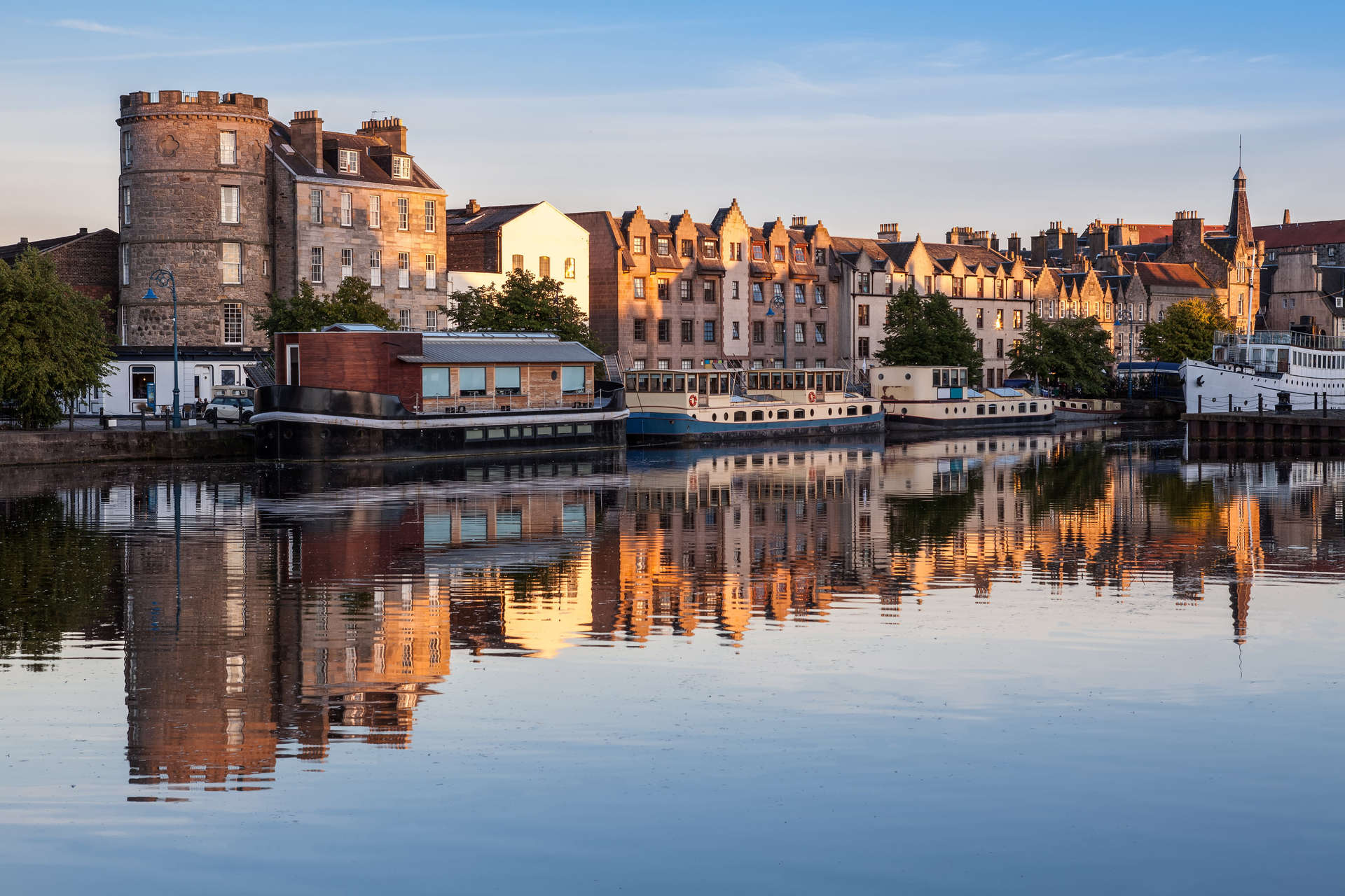 Reflection Of Buildings In River Against Sky In The Shore, Leith, Edinburgh
