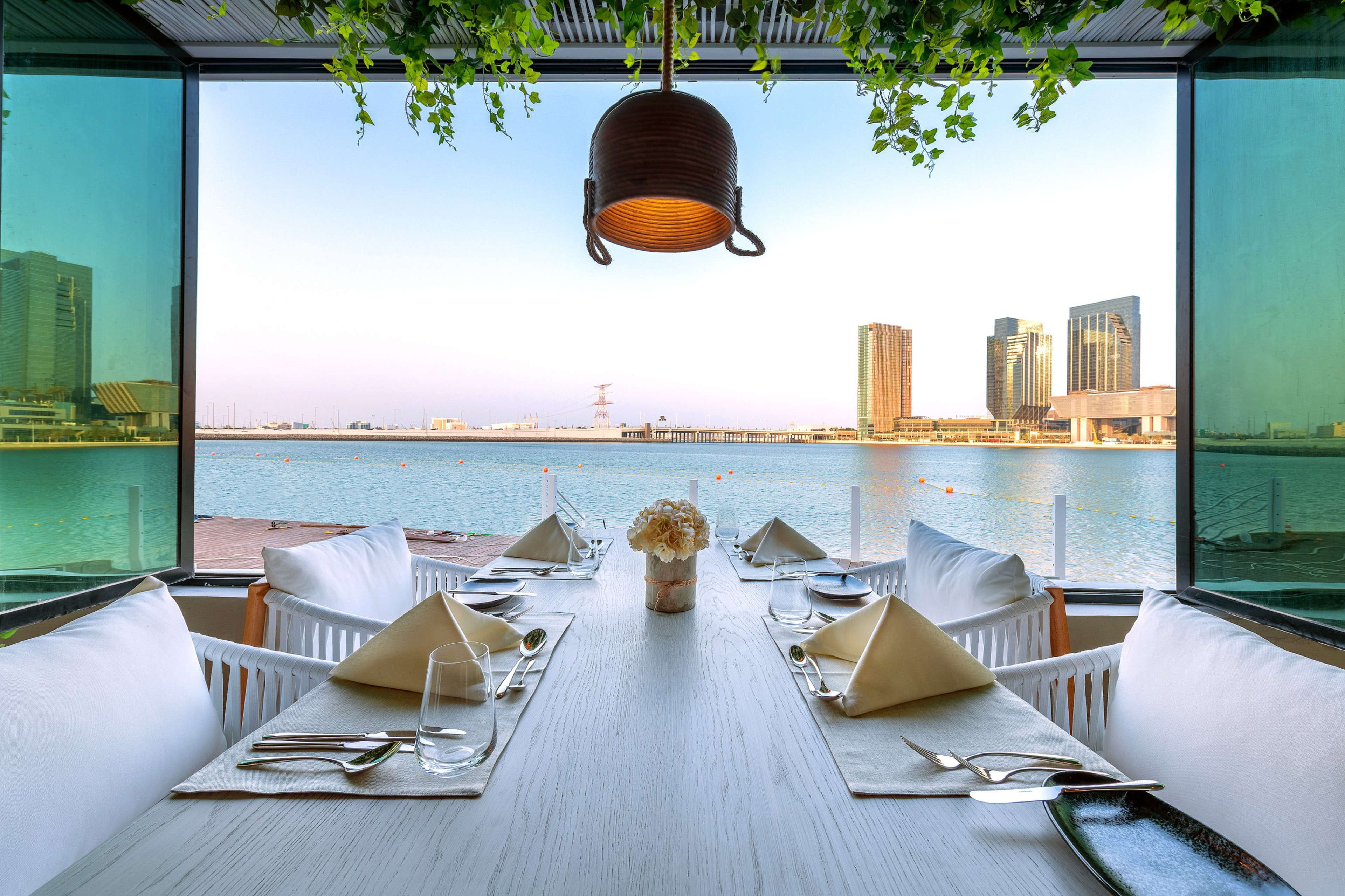 View of a restaurant along the water, Le Méridien Abu Dhabi