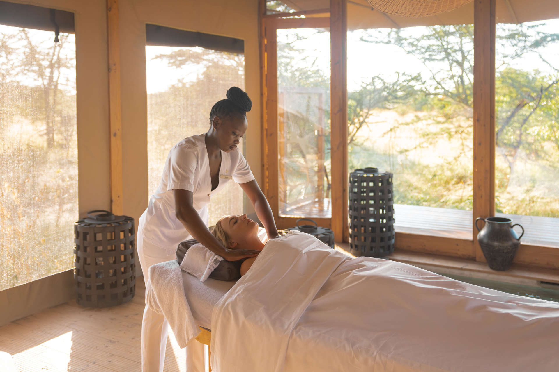 Woman having a treatment at The Spa by JW Marriott Masai Mara Lodge