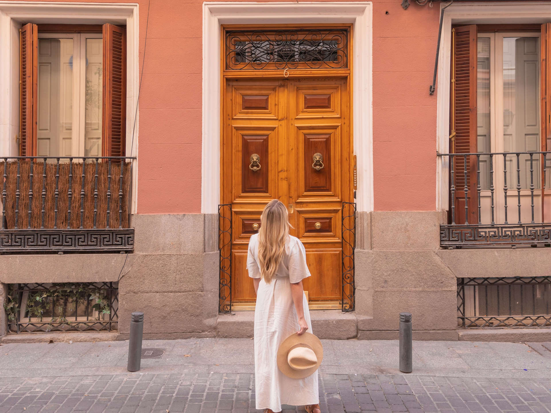 Woman looking at building in Barrio de las Letras