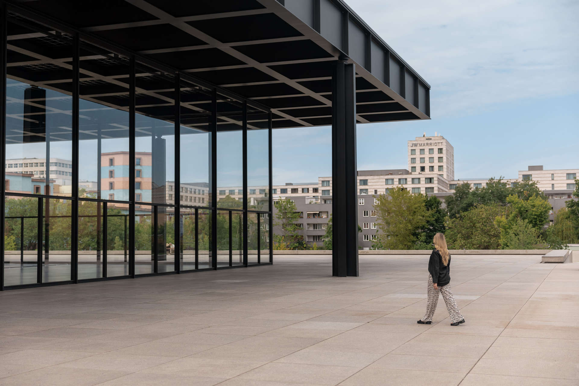 Woman visits the the Neue Nationalgalerie, modern art museum in Berlin