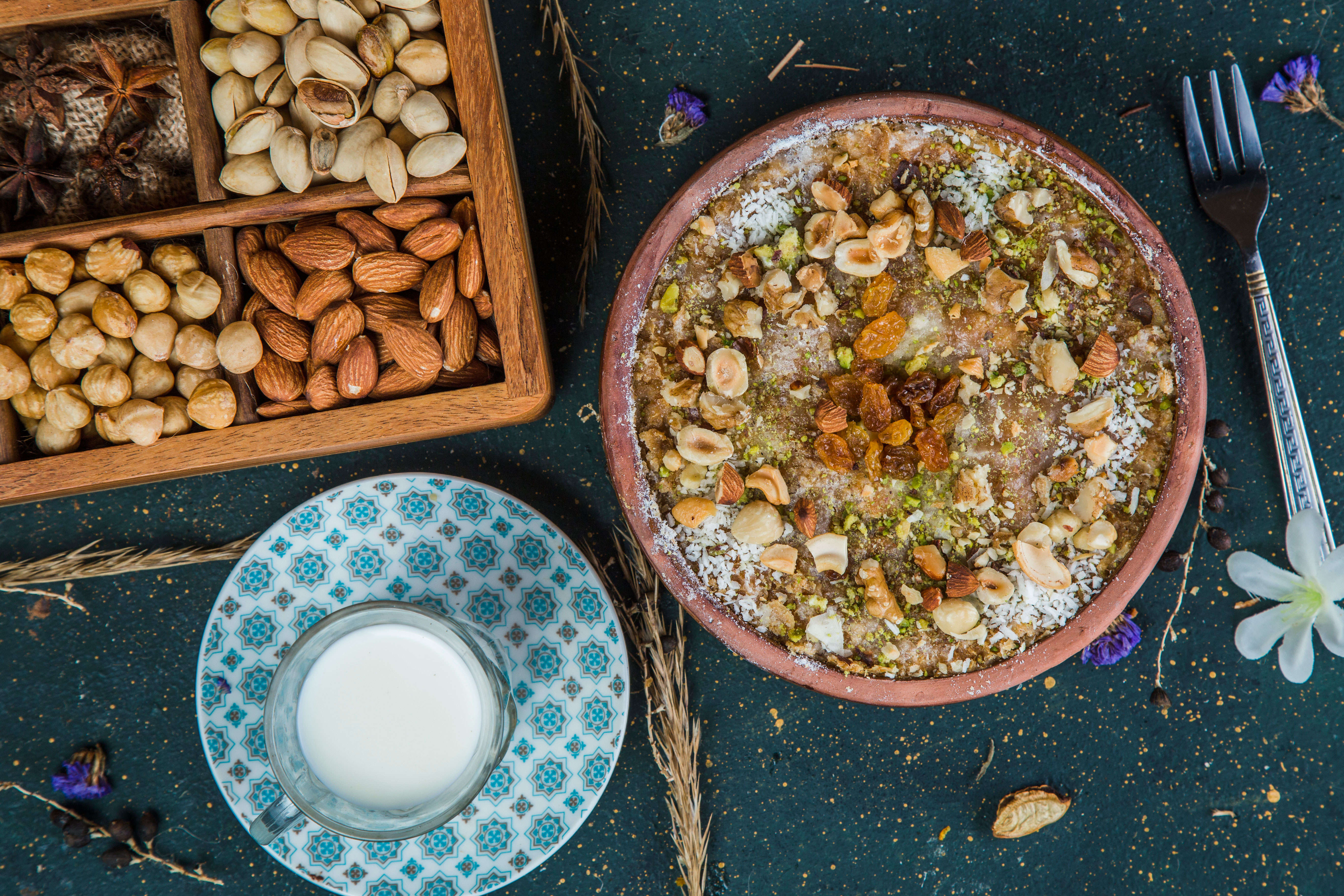 Umm Ali is made with sultanas, nuts and milk