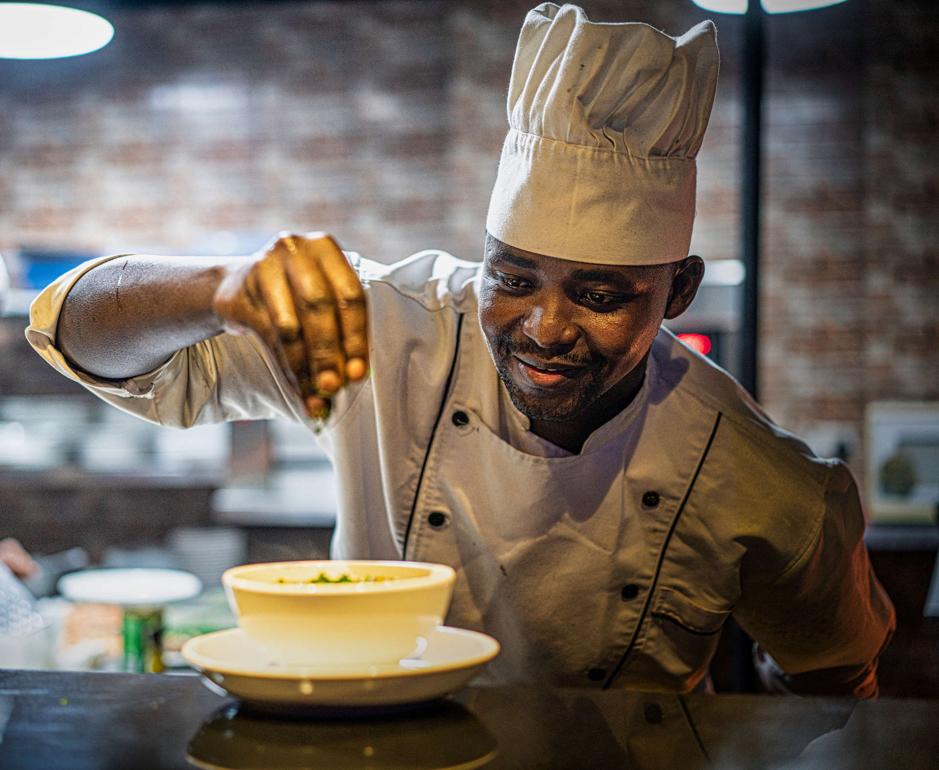 Chef preparing soup